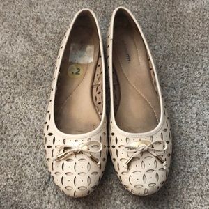 Beige and gold flats